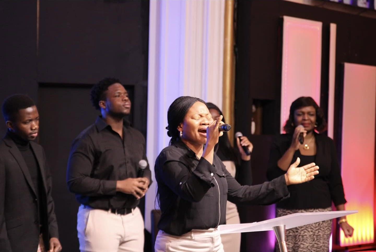 The praise team leads worship at Restoration Assembly, Albany